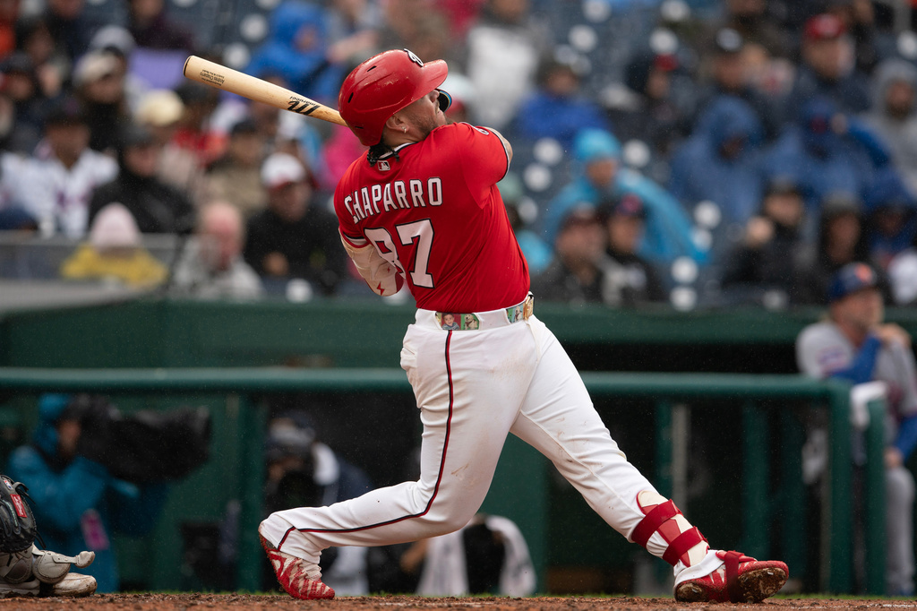 Washington Nationals' Andr&eacute;s Chaparro connects for a home run during the third inning of a baseball game against the New York Mets, Sunday, Sept. 27, 2026, in Washington. (AP Photo/Jose Luis Magana)