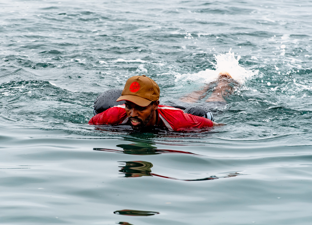 A migrant swims back to Morocco from the Spanish enclave of Ceuta on Friday 31 July 2026. (AP Photo/Antonio Sempere)