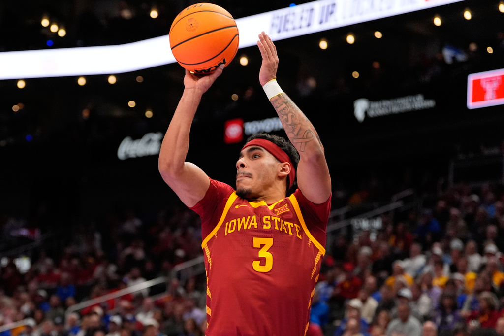 FILE - Iowa State's Tamin Lipsey makes a 3-point basket during the first half of an NCAA college basketball game against Texas Tech in the quarterfinal round of the Big 12 Conference tournament on March 12, 2026, in Kansas City, Mo. (AP Photo/Charlie Riedel, File)