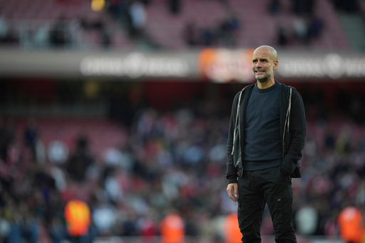 FILE - Manchester City's head coach Pep Guardiola walks off the ptich after the Premier League soccer match between Arsenal and Manchester City in London, on Sept. 21, 2025. (AP Photo/Kin Cheung, File) FILE - Manchester City's head coach Pep Guardiola walks off the ptich after the Premier League soccer match between Arsenal and Manchester City in London, on Sept. 21, 2025. (AP Photo/Kin Cheung, File)