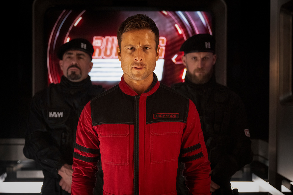 This image released by Paramount Pictures shows Glen Powell in a scene from "The Running Man." (Ross Ferguson/Paramount Pictures via AP)