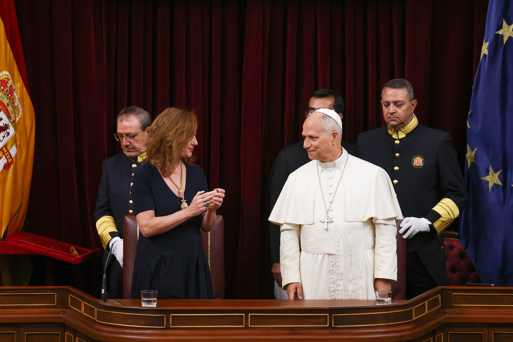 Pope Leo XIV is flanked by Francina Armengol, President of the Congress of Deputies of Spain, as he meets with members of the Spanish Parliament at the Congress of Deputies, in Madrid, Monday, June 8, 2026. (Yara Nardi, Pool Photo via AP)