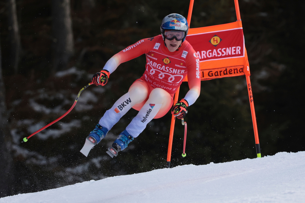 Switzerland's Marco Odermatt speeds down the course during an alpine ski, men's World Cup downhill, in Val Gardena, Italy, Thursday, Dec. 18, 2025. (AP Photo/Luciano Bisi)