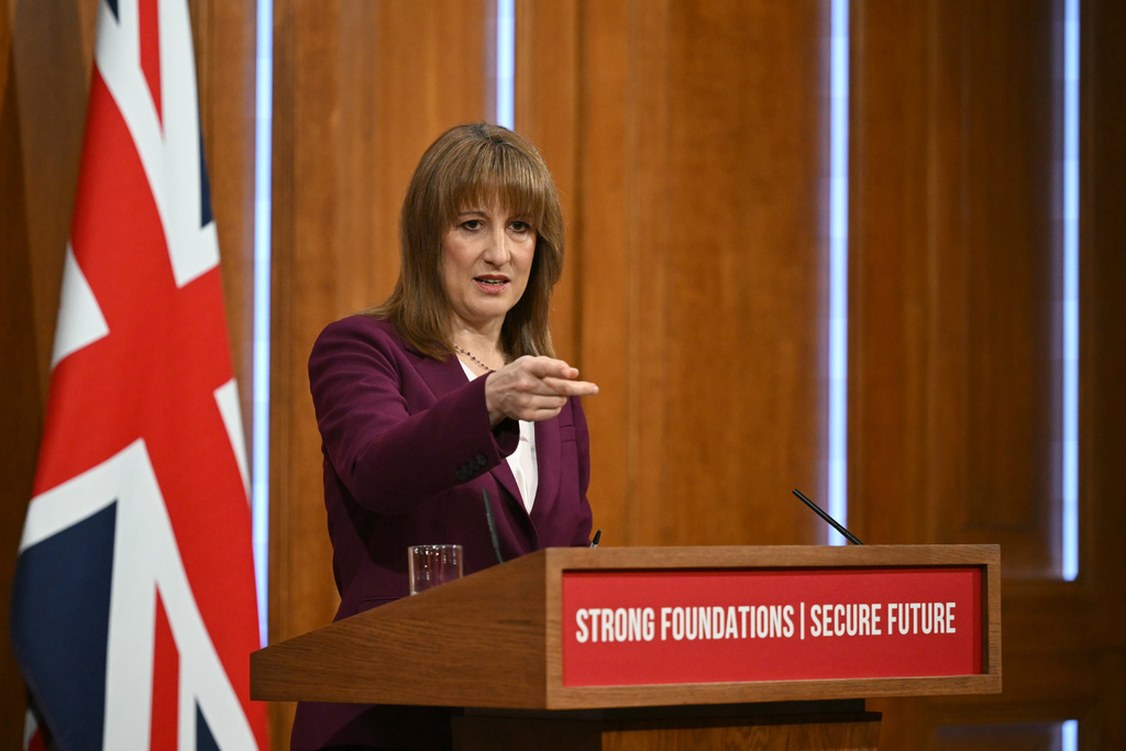 Britain's Chancellor of the Exchequer Rachel Reeves takes journalists' questions after delivering a speech in the media briefing room of 9 Downing Street, London, Tuesday Nov. 4, 2025. (Justin Tallis/Pool Photo via AP)