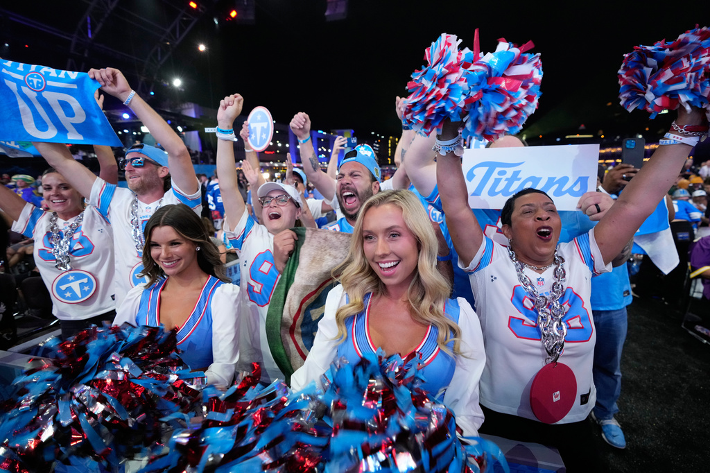Tennessee Titans fans cheer during the second round of the NFL football draft, Friday, April 24, 2026, in Pittsburgh. (AP Photo/Sue Ogrocki)