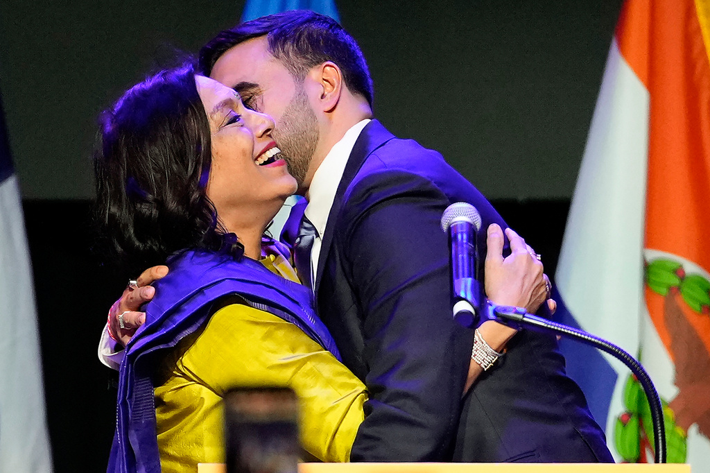 Mayor-elect Zohran Mamdani right, greets his mother Mira Nair, after making an acceptance speech, Tuesday, Nov. 4, 2025, in New York. (AP Photo/Yuki Iwamura)