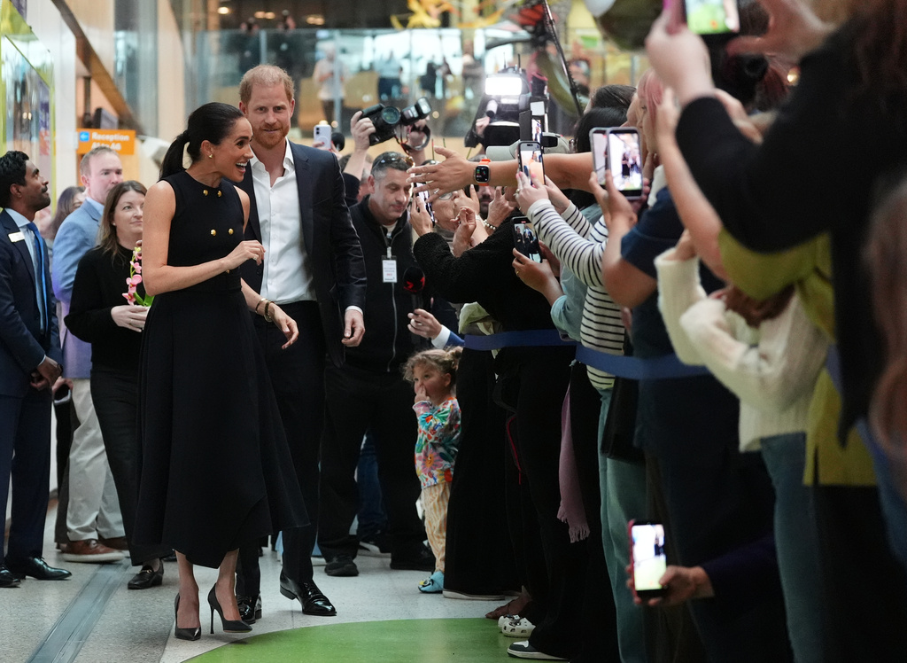 Britain's Prince Harry and Meghan Markle, the Duke and Duchess of Sussex, visit the Royal Children's Hospital Melbourne, Australia Tuesday, April 14, 2026. (Jonathan Brady/Pool Photo via AP)