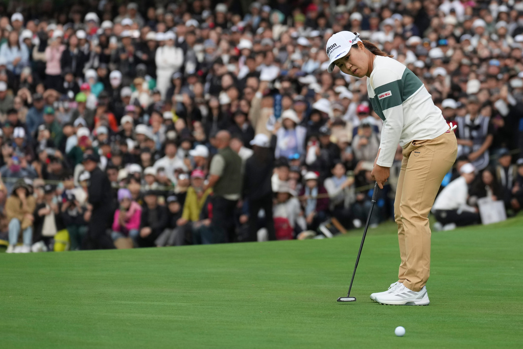 Nasa Hataoka of Japan plays a shot at the 18th green during the final round of the LPGA Ladies Championship golf tournament at the Pine Beach Golf Links, in Haenam, South Korea, Sunday, Oct. 19, 2025. (AP Photo/Lee Jin-man)