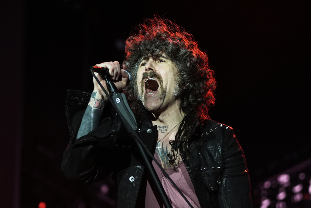 Davey Havok of the rock band AFI performs during the Corona Capital music festival in Mexico City, Sunday, Nov. 16, 2025. (AP Photo/Claudia Rosel)