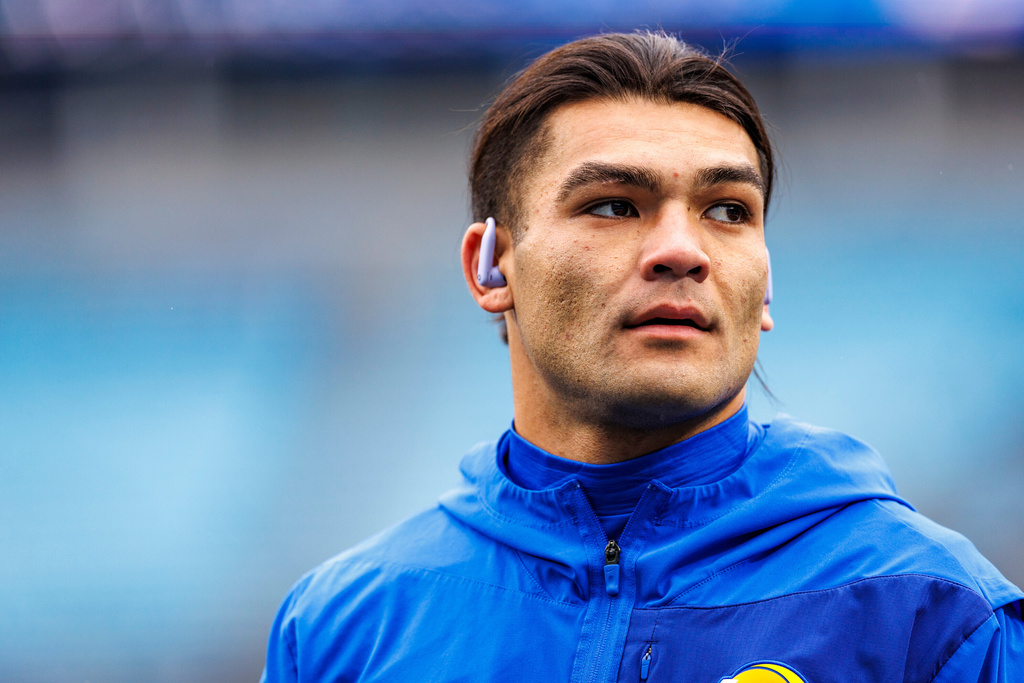 FILE - Los Angeles Rams wide receiver Puka Nacua (12) warms up before an NFL football game against the Carolina Panthers, Nov. 30, 2025, in Charlotte, N.C. (AP Photo/Rusty Jones, File)
