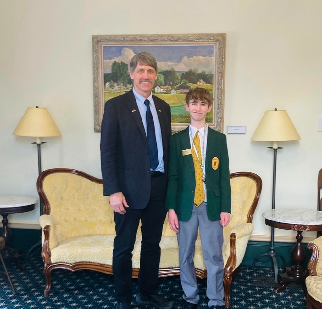 Legislative page Dean Roy is pictured with Vermont Lieutenant Governor John Rodgers on Friday, February 14, 2025, in Montpelier, Vermont. (Chessie Roy via AP)