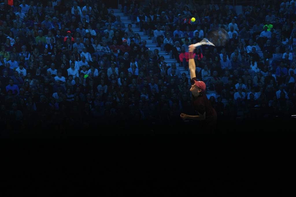 Italy's Jannik Sinner returns the ball to Germany's Alexander Zverev during their tennis match of the ATP World Tour Finals, in Turin, Italy, Wednesday, Nov. 12, 2025. (AP Photo/Antonio Calanni)