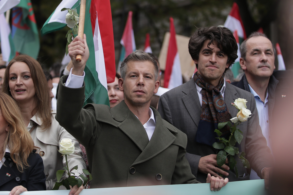 The leader of the Hungarian opposition TISZA party, Peter Magyar, rallies during a demonstration marking the 69th anniversary of the outbreak of Hungary's 1956 revolution against communist rule and the Soviet Union, in Budapest, Hungary, Thursday, Oct. 23, 2025. (AP Photo/Rudolf Karancsi)
