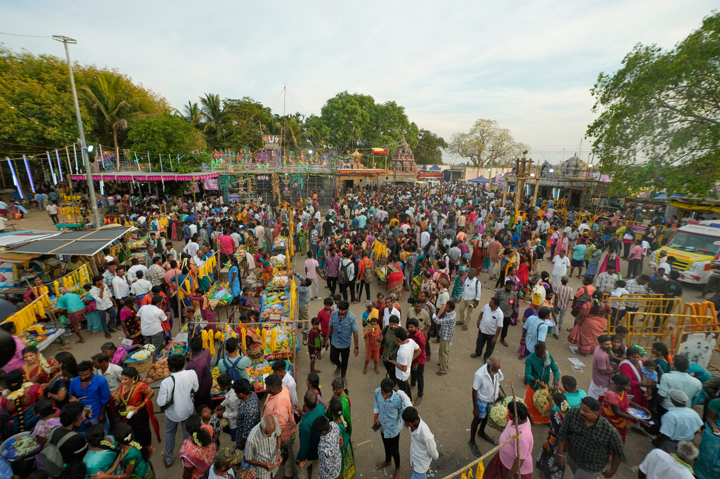 Hindu devotees and transgender participants arrive for the Koovagam transgender festival in Kallakurichi district, in the southern Indian state of Tamil Nadu, Tuesday, April 28, 2026. (AP Photo/Mahesh Kumar A.)