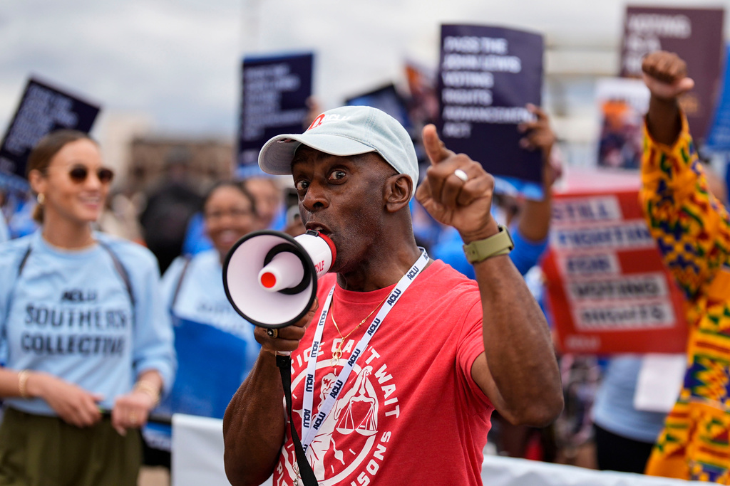 People march during the 61st Bloody Sunday Anniversary, Sunday, March 8, 2026, in Selma, Ala. (AP Photo/Mike Stewart)