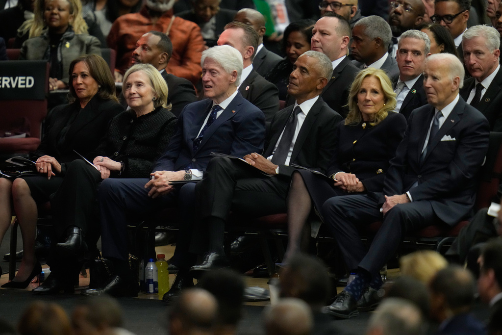 From left, Former Vice President Kamala Harris, former Secretary of State Hillary Clinton, former President Bill Clinton, former President Barack Obama, Jill Biden, and former President Joe Biden attend the Public Homegoing Service for the Rev. Jesse Jackson at the House of Hope in Chicago, Friday, March 6, 2026. (AP Photo/Erin Hooley)