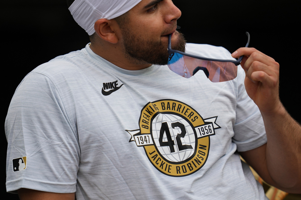 Tampa Bay Rays' Jonathan Aranda wears a shirt with the number 42 for Jackie Robinson Day before a baseball game against the Chicago White Sox, Wednesday, April 15, 2026, in Chicago. (AP Photo/Erin Hooley)
