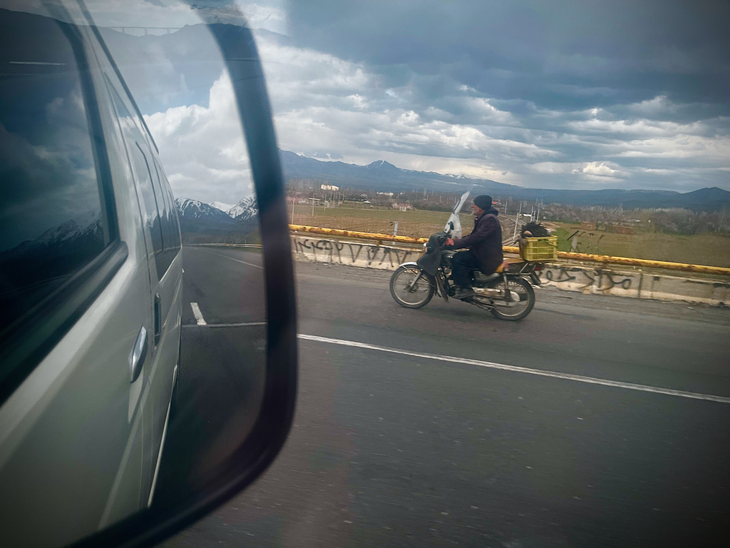 A man drives a motorbike along Road 32 near Marand, Iran, Thursday, April 9, 2026. (AP Photo/Francisco Seco)