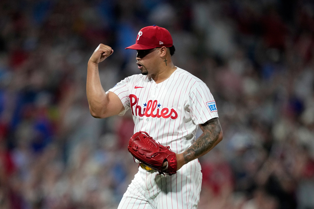 Philadelphia Phillies pitcher Jhoan Duran reacts after Cincinnati Reds' TJ Friedl grounded out to end their baseball game Monday, May 18, 2026, in Philadelphia. (AP Photo/Matt Slocum)