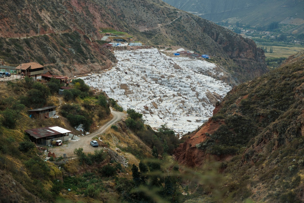 Salineras de Maras, the Maras salt mines, are mined by families who have owned the ponds for generations in the Sacred Valley, near Cusco, Peru on Saturday, Aug. 30, 2025. (AP Photo/Alie Skowronski)