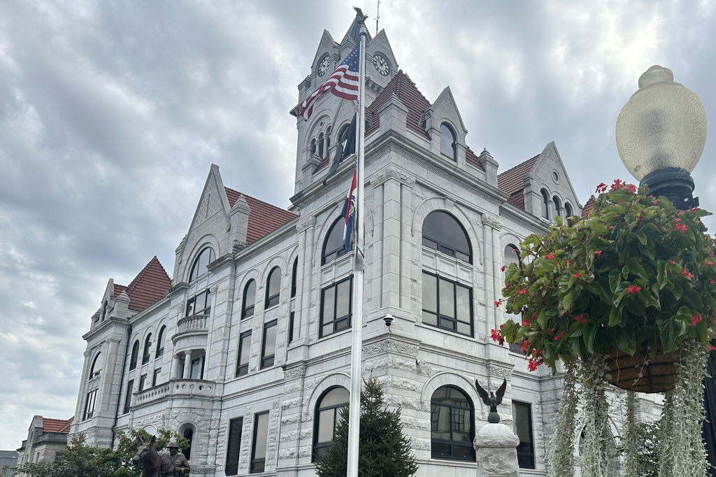 This photo taken with a smartphone shows a U.S. flag flying in front of the Cole County Courthouse in Jefferson City, Mo., Monday, Sept. 14, 2026. (AP Photo/David A. Lieb)