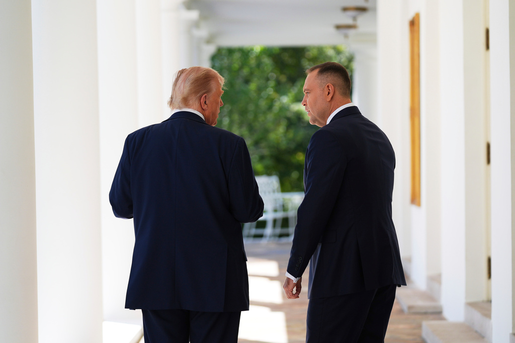 FILE - President Donald Trump and Polish President Karol Nawrocki, right, walk along the colonnade toward the Oval Office at the White House, Sept. 3, 2025, in Washington. (AP Photo/Evan Vucci, File)