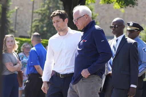 Minnesota Gov. Tim Walz, right, walks with Minneapolis Mayor Jacob Frey outside the Annunciation Catholic School following a shooting Wednesday, Aug. 27, 2025, in Minneapolis. (AP Photo/Bruce Kluckhohn) Minnesota Gov. Tim Walz, right, walks with Minneapolis Mayor Jacob Frey outside the Annunciation Catholic School following a shooting Wednesday, Aug. 27, 2025, in Minneapolis. (AP Photo/Bruce Kluckhohn)
