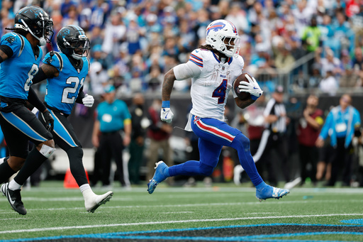 Buffalo Bills running back James Cook III (4) runs into the endzone for a touchdown against the Carolina Panthers during the second half an NFL football game, Sunday, Oct. 26, 2025, in Charlotte, N.C. (AP Photo/Rusty Jones) Buffalo Bills running back James Cook III (4) runs into the endzone for a touchdown against the Carolina Panthers during the second half an NFL football game, Sunday, Oct. 26, 2025, in Charlotte, N.C. (AP Photo/Rusty Jones)
