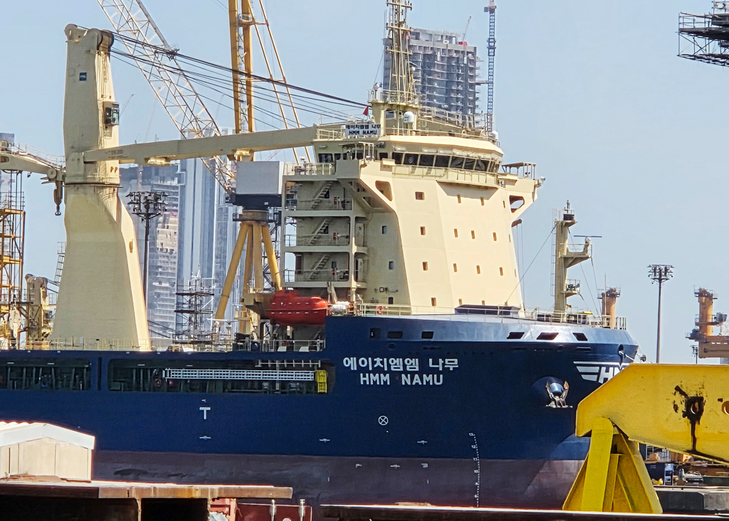 The South Korean-operated vessel HMM NAMU is docked after being damaged from a fire following an explosion in the Strait of Hormuz, at a port in Dubai, United Arab Emirates, Friday, May 8, 2026. (Kim Sang-hun/Yonhap via AP)