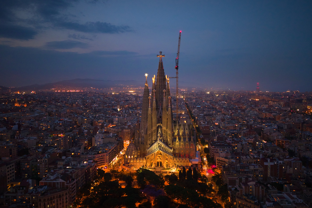 Antoni Gaudí's Basilica of the Sagrada Familia stands at dusk in Barcelona, Spain, Saturday, May 30, 2026, ahead of Pope Leo XIV's visit to Barcelona in June. (AP Photo/Emilio Morenatti)