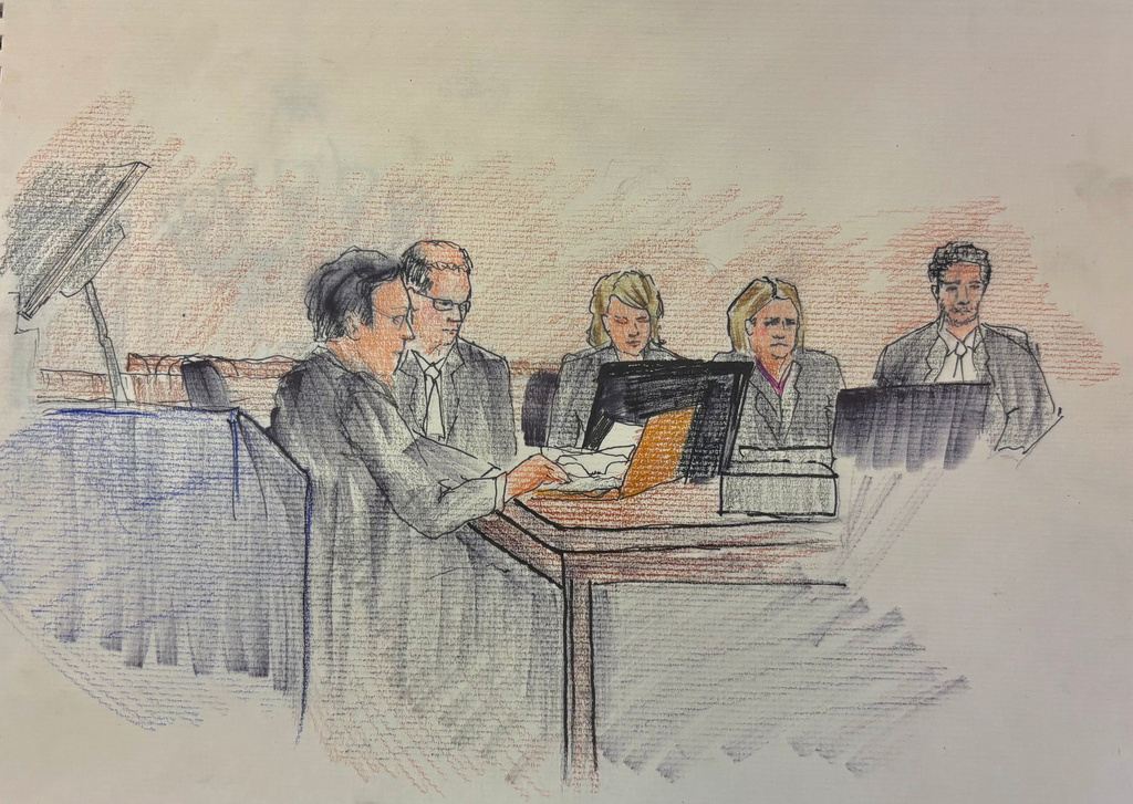 This courtroom sketch depicts Milwaukee County Circuit Judge Hannah Dugan, second right, with her attorneys in court as jury selection in her trial begins, Thursday, Dec. 11, 2025 in Milwaukee, Wis. (Adele Tesnow via AP)