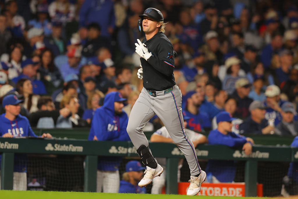 Miami Marlins' Kyle Stowers celebrates his two-run home run during the sixth inning of a baseball game against the Chicago Cubs, Wednesday, Sept. 23, 2026, in Chicago. (AP Photo/Melissa Tamez)