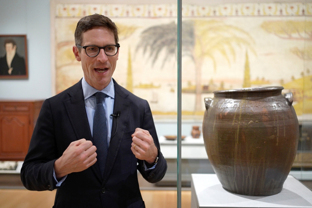 Ethan Lasser, Art of the Americas Chair at the Museum of Fine Arts, describes enslaved potter David Drake's poetry as a "voice resistance," during an interview, Monday, Nov. 10, 2025, in Boston. (AP Photo/Robert F. Bukaty)