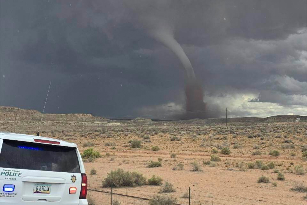 In this photo released by the Navajo Police Department, a tornado funnel is seen Sat., Sept. 13, 2025, northeast of Montezuma Creek, Utah. (Navajo Police Department via AP)