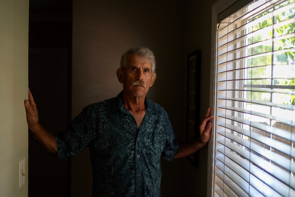 Christy Morrill, who lost decades of memories to autoimmune encephalitis, is photographed at his home, Wednesday, Aug. 20, 2025, in San Carlos, Calif. (AP Photo/David Goldman)
