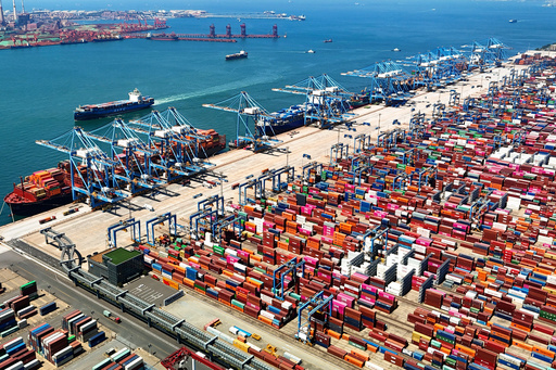 FILE - An aerial view of a container port is seen in Qingdao in east China's Shandong province, on June 6, 2024. (Chinatopix via AP, File) FILE - An aerial view of a container port is seen in Qingdao in east China's Shandong province, on June 6, 2024. (Chinatopix via AP, File)