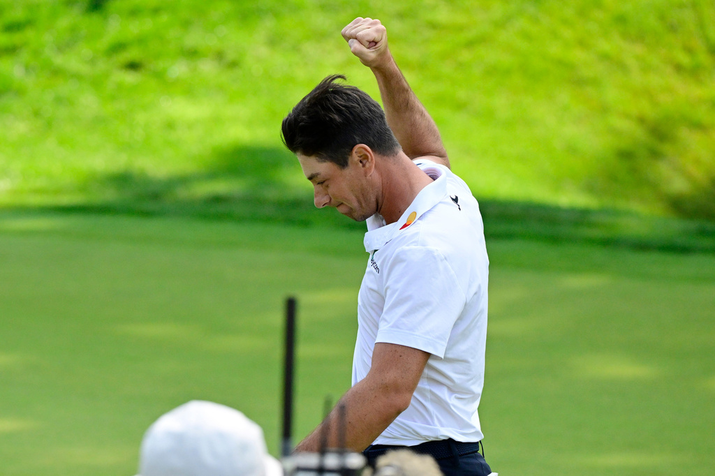 Viktor Hovland, of Norway, reacts after winning the Travelers Championship golf tournament at TPC River Highlands, Monday, June 29, 2026, in Cromwell, Conn. (AP Photo/Jessica Hill)