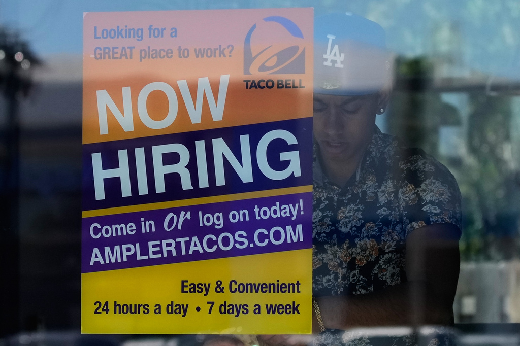 FILE - A hiring sign is displayed at a restaurant in Niles, Ill., Thursday, May 14, 2026. (AP Photo/Nam Y. Huh, File)