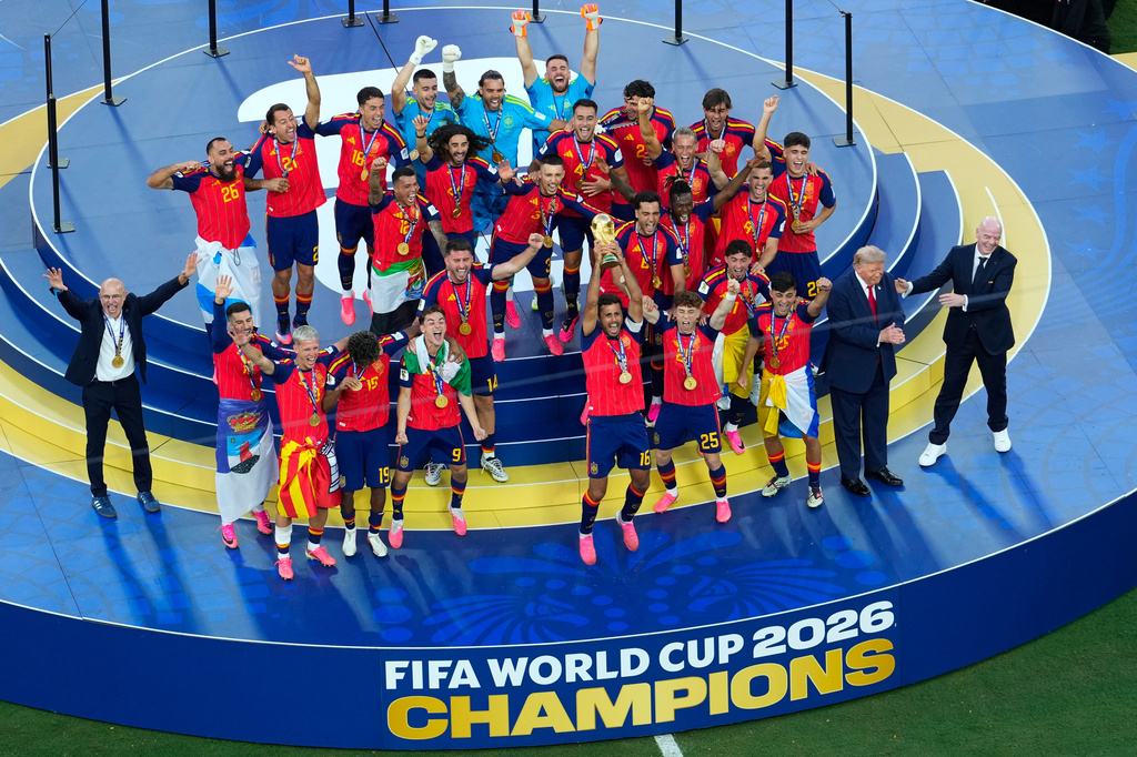 Spain players celebrate after the World Cup final soccer match between Spain and Argentina in East Rutherford, N.J., near New York, Sunday, July 19, 2026. (AP Photo/Yuki Iwamura)