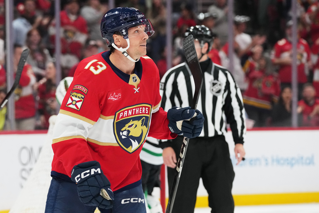 Florida Panthers center Sam Reinhart (13) reacts after scoring a goal during the second period of an NHL hockey game against the Dallas Stars, Saturday, Nov. 1, 2025, in Sunrise, Fla. (AP Photo/Lynne Sladky)