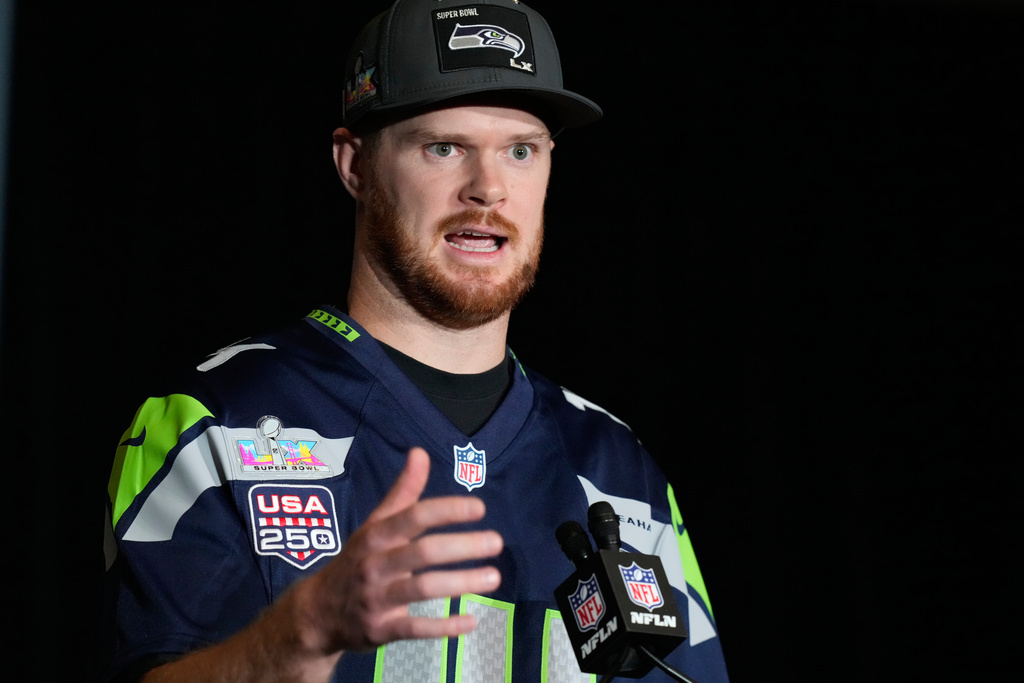 Seattle Seahawks quarterback Sam Darnold (14) speaks during a news conference on Thursday, Feb. 5, 2026, in San Jose, Calif., ahead of Super Bowl 60 between the New England Patriots and the Seattle Seahawks. (AP Photo/Brynn Anderson)