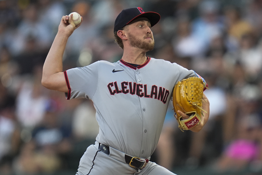 Cleveland Guardians starting pitcher Tanner Bibee throws against the Chicago White Sox during the first inning of a baseball game Friday, Aug. 8, 2025, in Chicago. (AP Photo/Erin Hooley)