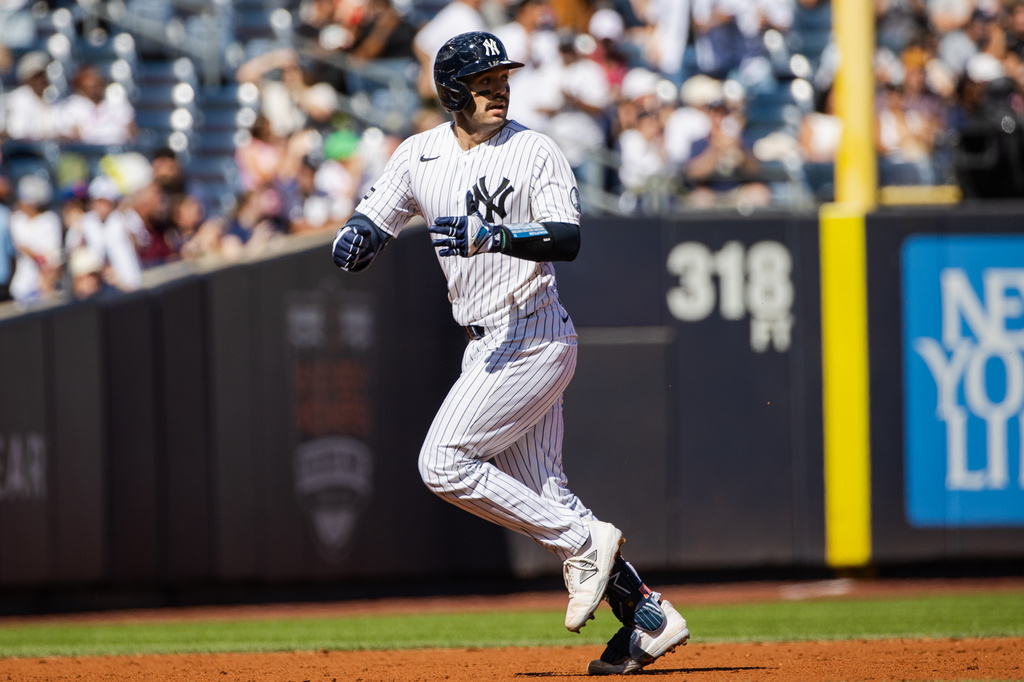New York Yankees' Austin Wells runs the bases after hitting a home run during the third inning of a baseball game against the New York Mets, Sunday, Sept. 13, 2026, in New York. (AP Photo/Angelina Katsanis)