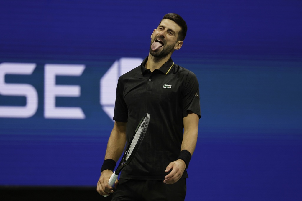 Novak Djokovic, of Serbia, reacts against =]Cameron Norrie, of Great Britain, during the third round of the U.S . Open tennis championships, Friday, Aug. 29, 2025, in New York. (AP Photo/Adam Hunger)