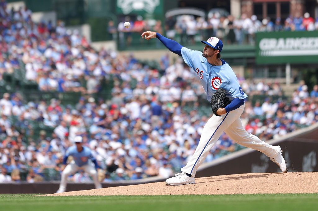 Chicago Cubs pitcher Clay Holmes delivers to a St. Louis Cardinals batter during the first inning of a baseball game in Chicago, Friday, Aug. 14, 2026. (AP Photo/Jessie Alcheh)