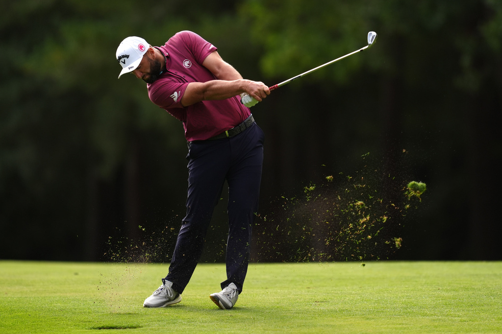 Spain's Jon Rahm plays on the 13th fairway on day two of the PGA Championship at Wentworth Golf Club, in Virginia Water, England, Friday, Sept. 18, 2026. (Adam Davy/PA via AP)