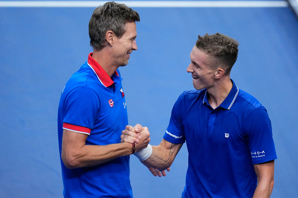 Czechia's Jiri Lehecka celebrates with his captain Tomas Berdych after defeating United States' Ben Shelton during the Davis Cup second round qualifier match between the Czech Republic and the United States, in Prague, Friday, Sept. 18, 2026. (AP Photo/Petr David Josek)