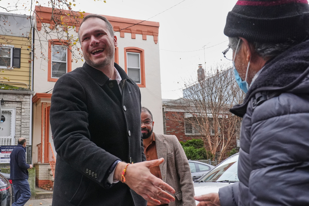 Jersey City mayoral candidate James Solomon greets people at a food drive Tuesday, Nov. 25, 2025, in Jersey City, N.J. (AP Photo/Frank Franklin II)