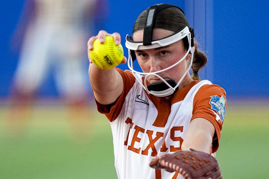 Texas Longhorns pitcher Teagan Kavan (17) throws a pitch against Texas Tech during Game 1 of the NCAA Women's College World Series softball championship series on Wednesday, June 3, 2026, in Oklahoma City, Oklahoma. (Aaron E. Martinez/Austin American-Statesman via AP)