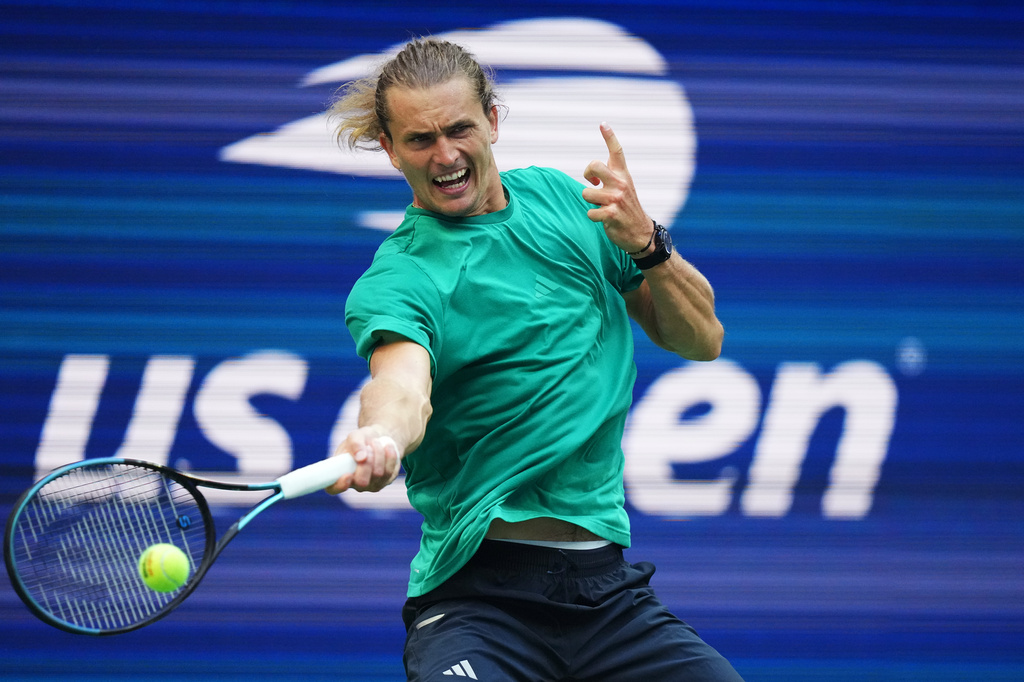 Alexander Zverev, of Germany, returns the ball to Novak Djokovic, of Serbia, during a practice at the U.S. Open tennis championships Wednesday, Aug. 26, 2026, in New York. (AP Photo/Frank Franklin II)